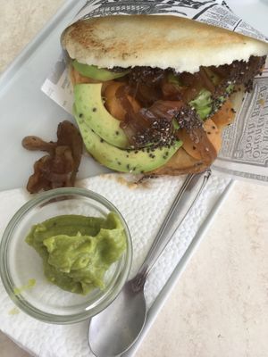 Venezuelan corn arepa with hummus, avocado, and vegan sausage at Aqui y Ahora  in Lanzarote