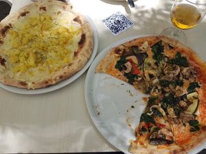 Vegan Potato pizza and mushroom pizza at Pizza Paco in Barcelona
