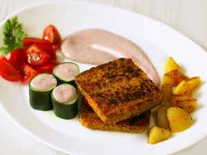 Crispy Croquettes with blueberry sauce and fresh salad
 at Vege Joy in Varna