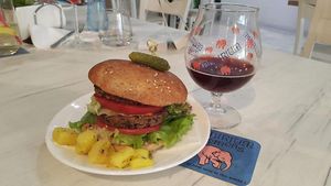 Veg Feijoada Burger (whole grain bread, croquette from black beans, brown rice and oats, green lettuce, tomato, pickles, vegan mayonnaise sauce, cheddar, served with French fries)  at Vege Joy in Varna