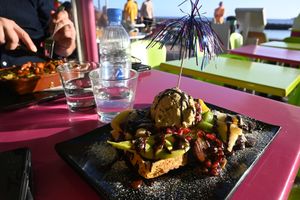 Vegan lasagna and vegan woffle with ice cream and fruit.  at Gelatomania in Gran Canaria