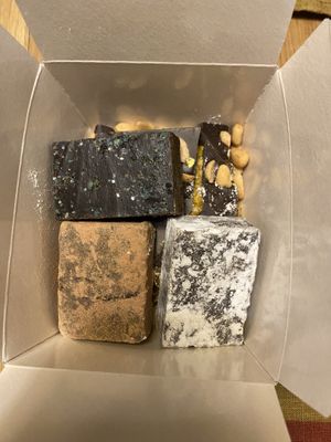 Caramel-sea salt chocolate, Bailey’s chocolate, peppermint chocolate. Underneath is snickers    at Karu Talu Šokolaad  in Tallinn