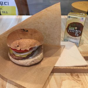 Vegan tomato cheese burger!! ???? Tasty!! at Moomoo Burger & Smoothie in Busan