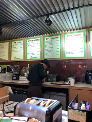 The master at work. at Moomoo Burger & Smoothie in Busan