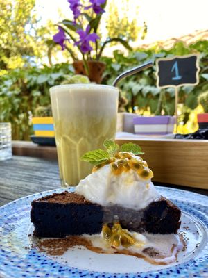Cake of the day (chocolate cake) and iced golden milk  at Little Good Things in Mae Hong Son