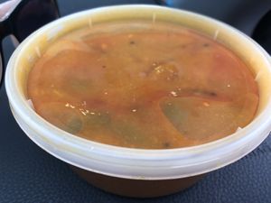 Curry soup with pepper  at Chennai Dosa in Hicksville