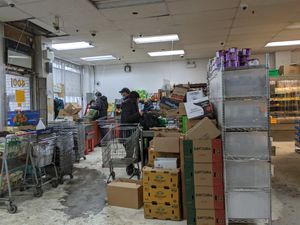 Four cashier stations at front at Segal's Market in Montreal