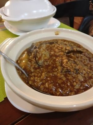 Aubergine and soya mince in oyster sauce, tastes better than it looks, with a lovely hint of ginger.  at Lotus Vegan Cuisine in Glasgow