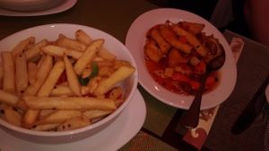 Portion of fries and tofu at Lotus Vegan Cuisine in Glasgow