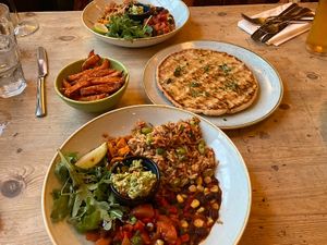 Vegan Mexican Super Bowl, sweet potato fries, garlic flatbread   at Lounges - Cordero Lounge in Frome