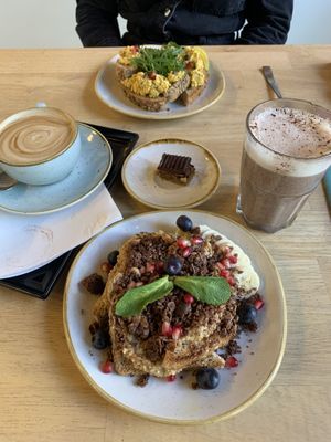 Toast with hazelnut paste, banana and chocolate granola and toast with vegan egg salad and apple, flat white and chocolate milk    at Madam Bakster in Ghent