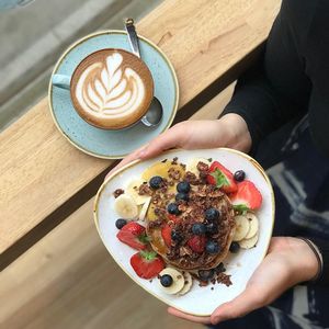 yummy vegan spelt pancakes accompanied by a delicious almond cappucino! at Madam Bakster in Ghent