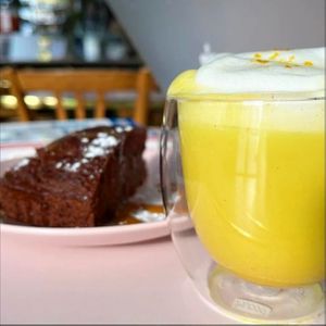 Chaî Latte with oat milk, and chocolate cake  at Le Myrha in Paris