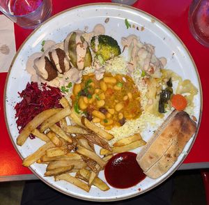 There’s an option to take a third of all three main dishes of the day.  at Le Myrha in Paris