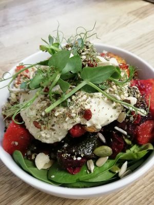 Middletown Eastern style salad bowl: quinoa tabbouleh/ spinach/ harissa roasted veg/ hummus/ za'atar/ toasted almonds & seeds/ barberries at Ribizli in Wallingford