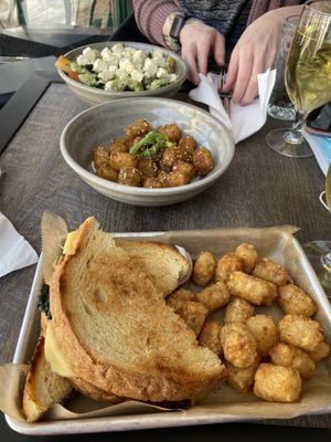 Vegan Grilled Cheese, Falafel Tots, and Yogi Bowl  at Taproot Cider House in Traverse City