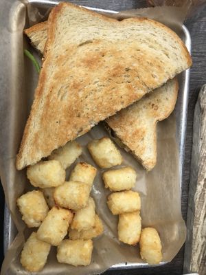 Best grilled ‘cheese’ with smoked Gouda, spinach, onion & jalapenaos  at Taproot Cider House in Traverse City