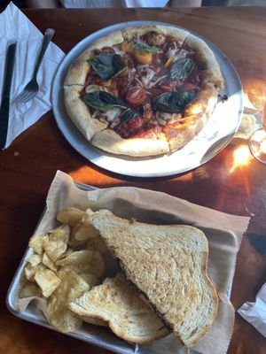 Margherita pizza with vegan cheese and the vegan grilled cheese yum delicious   at Taproot Cider House in Traverse City