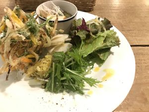 Set main with root vegetable fritters, cabbage and turnip miso soup and sweet potato and broccoli salad hiding in there too at Yidaki Cafe in Kobe