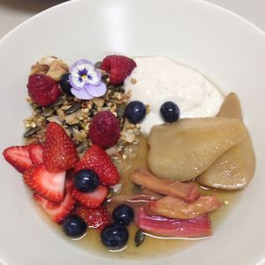 Gluten free spiced poached pear, rhubarb, coconut yoghurt and berries at Samadhi Whole Foods in Camden