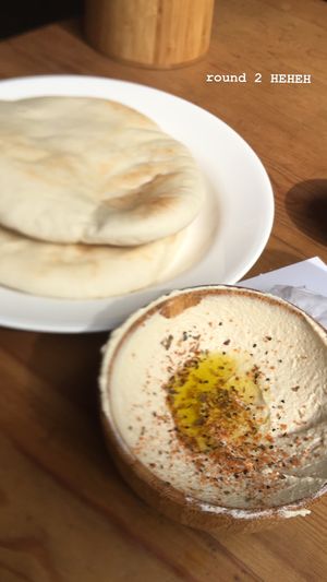 2 premium white pita ($1 each), small ala carte hummus $4 at Pita Bakery in Central Singapore