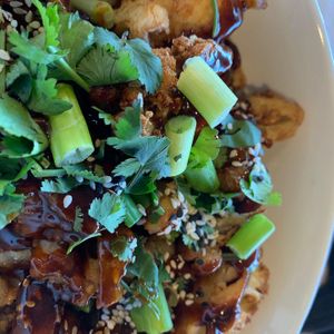 Cauliflower bites tossed in Korean BBQ sauce.  at Stem Farm and Kitchen in Baltimore