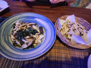 Spinach and mushrooms, Fried tofu at Yogis Spicy in Bangkok