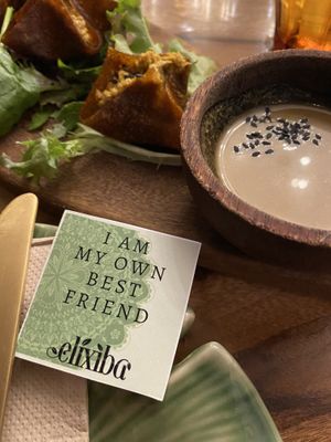 Raw dumplings and we each got a cute card on our plate  at Elixiba in Byron Bay