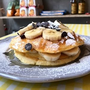 Our yummy vegan pancakes with banana and chocolate. Prepared freshly from scratch for each order. at Lele's in East London
