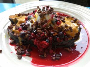 French toast w/ raspberry compote, coconut cream, peanut butter, and cocoa nibs at Lele's in East London