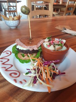 Gluten free special mexican style tempeh burger w/ potato salad at Dandelion Cafe in Saltaire