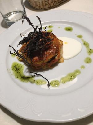 Millefoglie aubergine with basil parfumed oil at Orso Grigio in Cavalese