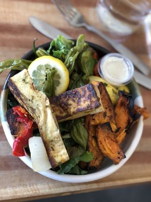 Base of greens, tofu, shishido peppers, sweet potatoes, and roasted veggies  at DIG in Rye Brook