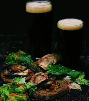 Dark beer and  Bruschettas at Animals in St Petersburg