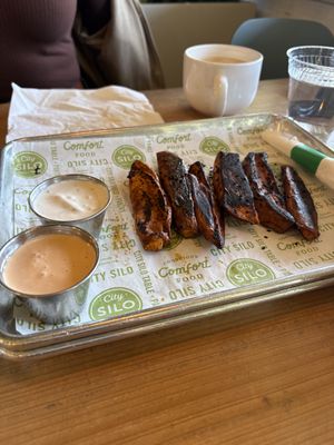 Sweet potato wedges with cashew ranch and sriracha aioli   at City Silo Table + Pantry in Memphis