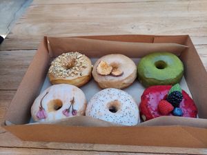 Maple nut, ginger apple cider , matcha green tea, sakura, lemon poppy seed, triple berry. at Good Town Doughnuts in Costa Mesa