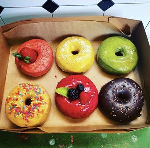 Triple Berry, Matcha, Mango Coconut, Chocolate Cocoa Nib, and Vanilla Rainbow 🌈 ❤️ at Good Town Doughnuts in Costa Mesa