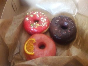 raspberry pistachio, blood orange and chocolate cocoa nibs at Good Town Doughnuts in Costa Mesa