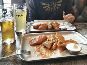 Seitan wings foreground at Doghouse  in Glasgow