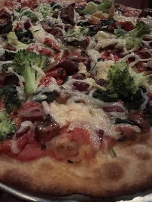 Pizza closeup   at Baba Louie's Sourdough Pizza in Great Barrington