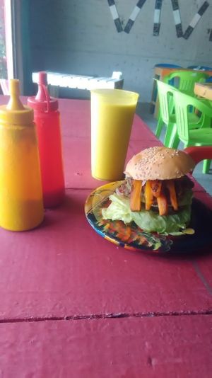 Hamburguesa doble, con salchicha de Zanahoria. at Moots in Puerto Escondido