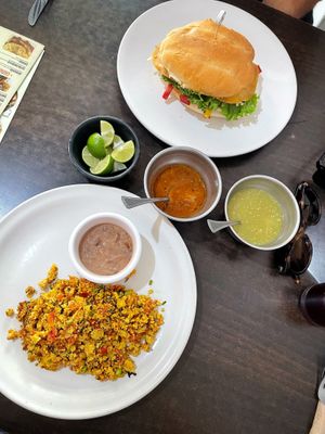 Torta Cubana & tofu scramble. Delicious salsas too.  at VEGuerrero in Mexico City