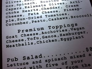 Tofu, eggplant, vegan cheese. They also have vegan meatballs at Elbow Room in Pensacola