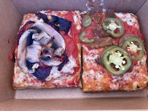 Happy hour build-your-own Sicilian slices: 2 for $7 + 50 cents per topping at Li'l Nonna's in Austin