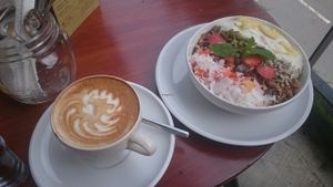 Cappuccino and yogurt fruit bowl at Lazy Cats  in Ubud