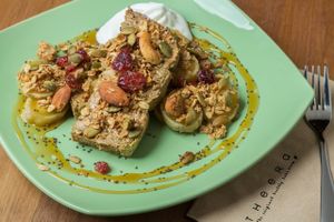 Vegan spinach toast with peanut butter, banana and granola at Steps in Bangkok