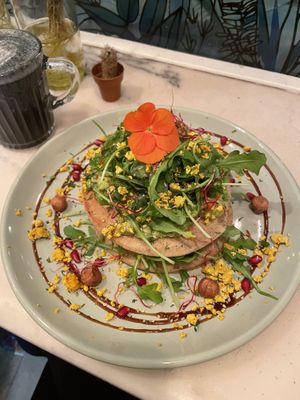 Charcoal latte with savory pancakes! Divine! at L'Abattoir Vegetal - Guisarde in Paris