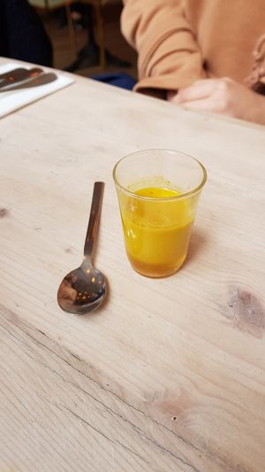 Shot curcuma at L'Abattoir Vegetal - Guisarde in Paris