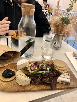 Faux cheese board and truffle fries  at L'Abattoir Vegetal - Guisarde in Paris