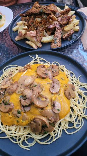 French fries with Seitan and Spaghetti with Mushrooms at Omphalos in Arequipa